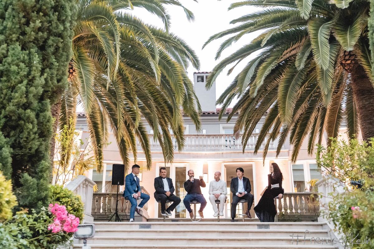 A panel conversation on the estate's front steps