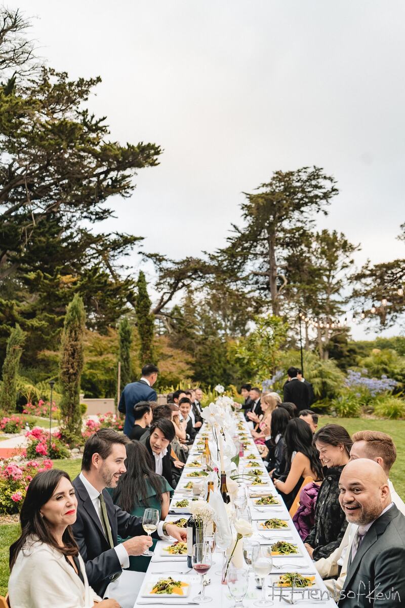 The long dinner table running down the lawn